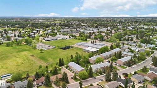 Expansive suburban landscape featuring residential homes and abundant mature trees - 17325 85 Avenue Nw, Edmonton, AB 