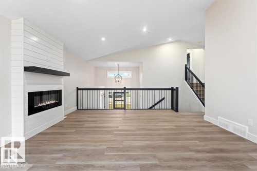 303 Fundy Way, Cold Lake, AB - Indoor Photo Showing Other Room With Fireplace
