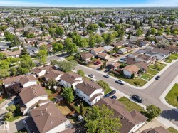 Aerial perspective showcasing an established neighborhood with a variety of residential properties - 