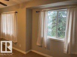 Window featuring a grid pattern and white trim - 