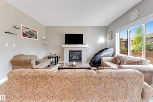 5930 19A Avenue, Edmonton, AB - Indoor Photo Showing Living Room With Fireplace