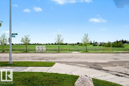 Grassed area with sidewalk and street frontage - 13004 164 Avenue, Edmonton, AB 