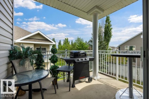 Covered outdoor balcony featuring a concrete floor - 71 3040 Spence Wynd, Edmonton, AB 
