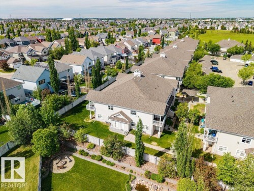 Aerial perspective showcasing a residential community with varied architectural styles - 71 3040 Spence Wynd, Edmonton, AB 