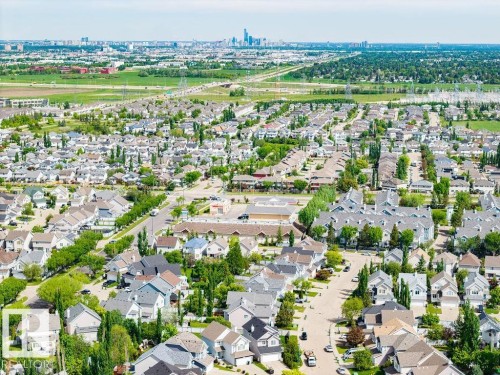 Aerial perspective showcasing a residential neighborhood with varied architectural styles - 71 3040 Spence Wynd, Edmonton, AB 