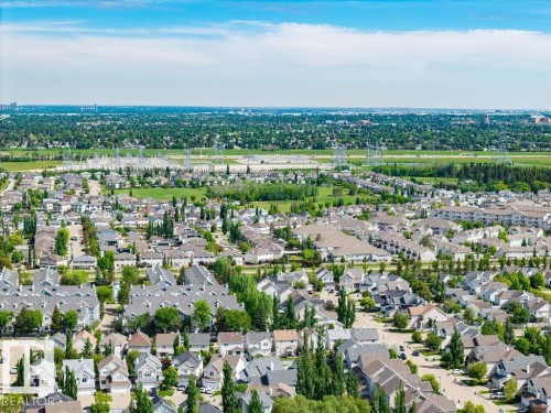 Expansive residential district featuring a mix of detached and attached homes - 71 3040 Spence Wynd, Edmonton, AB 