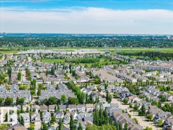 Expansive residential district featuring a mix of detached and attached homes - 