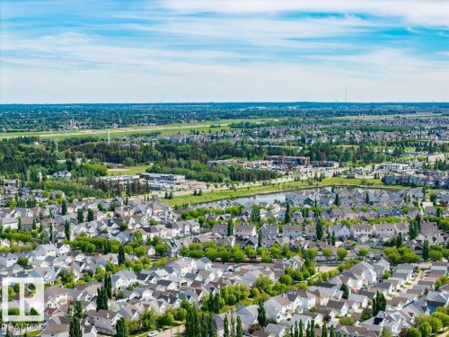 Residential neighborhood with a variety of single-family homes, mature trees, and green spaces - 71 3040 Spence Wynd, Edmonton, AB 