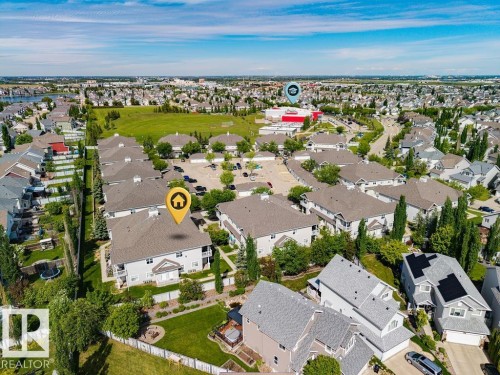Aerial perspective showcasing a residential community with abundant green spaces - 71 3040 Spence Wynd, Edmonton, AB 