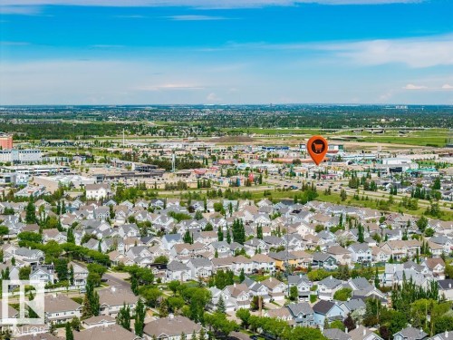Aerial perspective showcasing an expansive residential area with varied housing styles - 71 3040 Spence Wynd, Edmonton, AB 