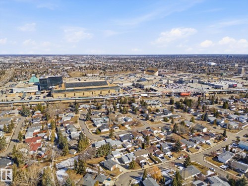 Aerial perspective showcasing a residential neighborhood with established homes and mature trees - 857 Erin Place, Edmonton, AB 