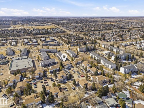 Aerial perspective showcasing an expansive residential area with diverse housing structures - 857 Erin Place, Edmonton, AB 