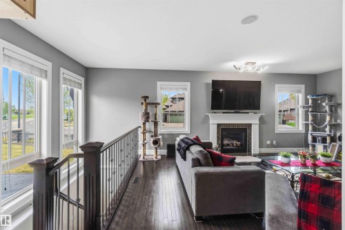 247 Ambleside Drive, Edmonton, AB - Indoor Photo Showing Other Room With Fireplace