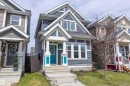 Contemporary two-story residence featuring blue siding and white trim - 8412 24 Avenue, Edmonton, AB 