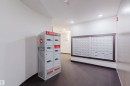 Interior mailroom featuring individual mailboxes and parcel lockers - 402 3670 139 Avenue, Edmonton, AB 