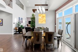 Dining area featuring wood-finish flooring and direct access to exterior through French doors - 