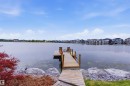 Private wooden dock extending into the lake - 9003 16 Avenue, Edmonton, AB 