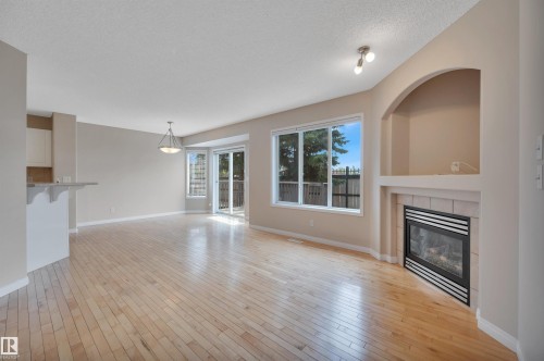54 155 Crocus Crescent, Sherwood Park, AB - Indoor Photo Showing Living Room With Fireplace