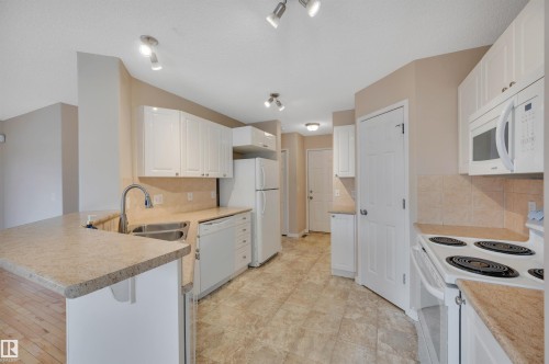 54 155 Crocus Crescent, Sherwood Park, AB - Indoor Photo Showing Kitchen With Double Sink
