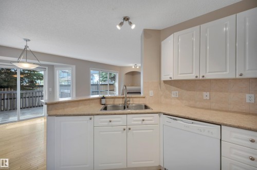 54 155 Crocus Crescent, Sherwood Park, AB - Indoor Photo Showing Kitchen With Double Sink