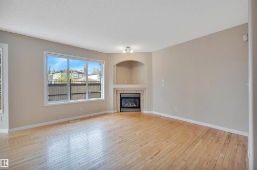 54 155 Crocus Crescent, Sherwood Park, AB - Indoor Photo Showing Living Room With Fireplace