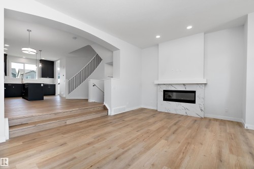5275 Edgemont Boulevard Nw, Edmonton, AB - Indoor Photo Showing Living Room With Fireplace