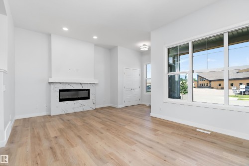 5275 Edgemont Boulevard Nw, Edmonton, AB - Indoor Photo Showing Living Room With Fireplace