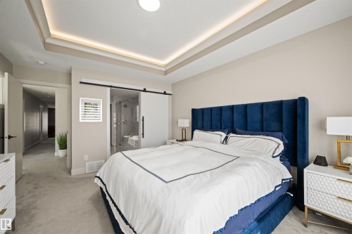 Tray ceiling with recessed lighting and a central flush-mount fixture - 12171 177 Avenue, Edmonton, AB 