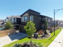 Contemporary two-story residence with dark horizontal siding and light trim accents - 12171 177 Avenue, Edmonton, AB 