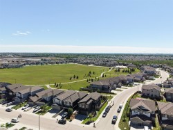 Aerial perspective showcasing a residential neighborhood with varied architectural styles - 