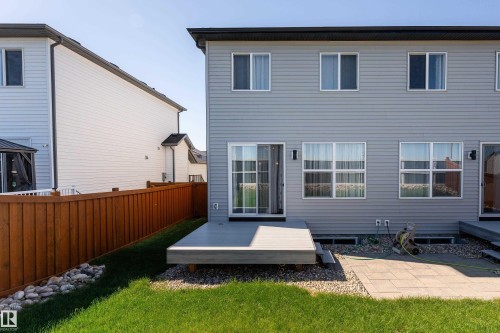Rear exterior showcasing light gray siding - 2520 152 Avenue, Edmonton, AB 