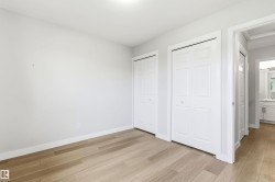 Bright interior space featuring light wood-finish flooring - 