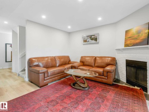 550 Lakewood Road Nw, Edmonton, AB - Indoor With Fireplace