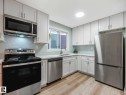 550 Lakewood Road Nw, Edmonton, AB  - Indoor Photo Showing Kitchen With Stainless Steel Kitchen 