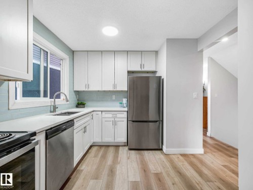 550 Lakewood Road Nw, Edmonton, AB - Indoor Photo Showing Kitchen With Stainless Steel Kitchen With Double Sink