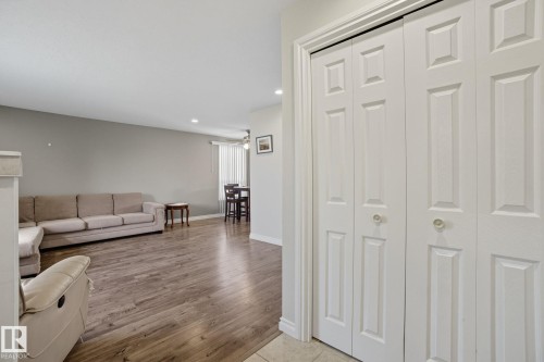 Bi-fold closet doors with panel detailing - 14239 53 Street, Edmonton, AB 