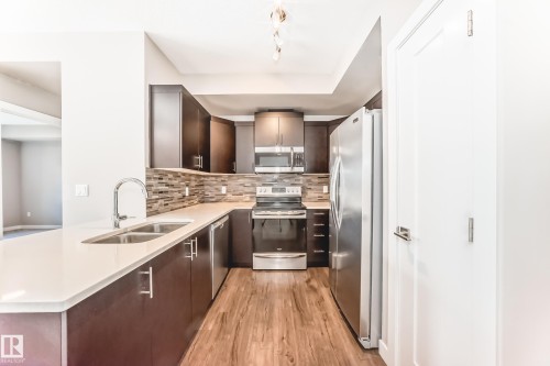 Kitchen - 303 560 Griesbach Parade Parade, Edmonton, AB 