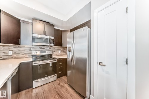Kitchen - 303 560 Griesbach Parade Parade, Edmonton, AB 