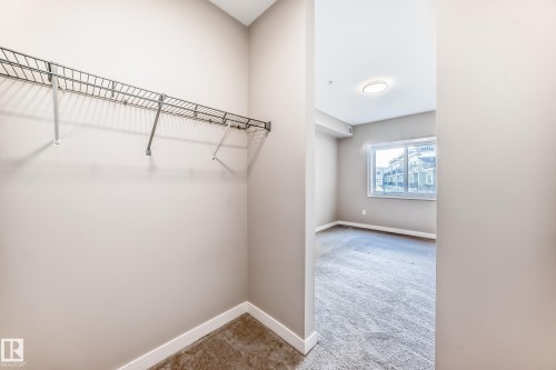 Walk in closet - 303 560 Griesbach Parade Parade, Edmonton, AB 