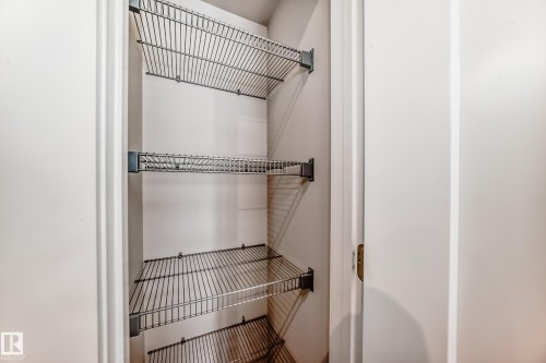 Built-in wire shelving system with multiple tiers - 303 560 Griesbach Parade Parade, Edmonton, AB 