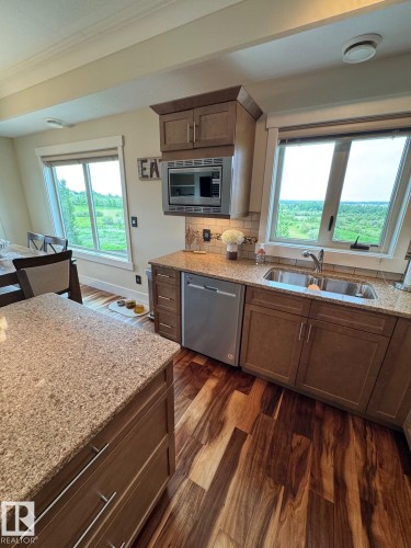 #302 5201 Brougham Dr, Drayton Valley, AB - Indoor Photo Showing Kitchen With Double Sink