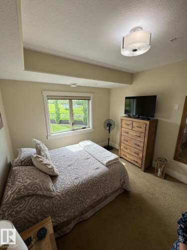 #302 5201 Brougham Dr, Drayton Valley, AB - Indoor Photo Showing Bedroom