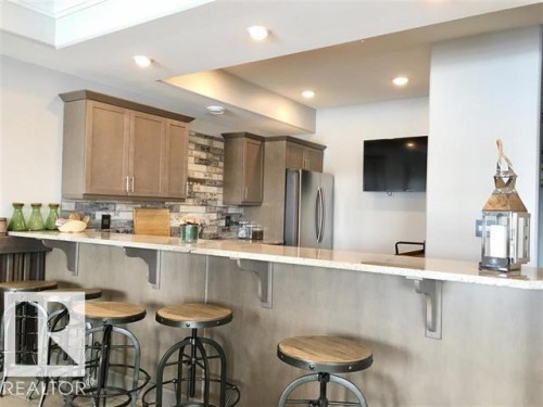 #302 5201 Brougham Dr, Drayton Valley, AB - Indoor Photo Showing Kitchen With Upgraded Kitchen