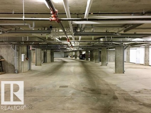#302 5201 Brougham Dr, Drayton Valley, AB - Indoor Photo Showing Garage