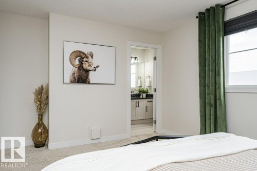 Room with neutral wall paint and light-colored carpeting - 721 Berg Loop, Leduc, AB - Indoor Photo Showing Bedroom