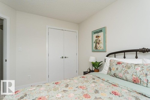 Neutral wall color with white trim - 721 Berg Loop, Leduc, AB - Indoor Photo Showing Bedroom