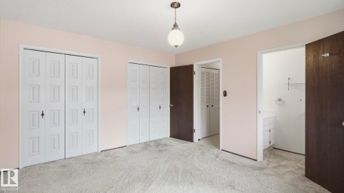 Carpeted room with light pink walls - 7408 40 Avenue, Edmonton, AB 