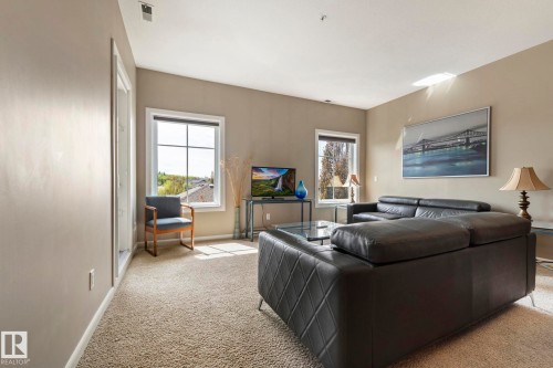 430 160 Magrath Road, Edmonton, AB - Indoor Photo Showing Living Room