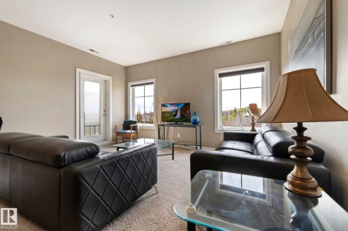 430 160 Magrath Road, Edmonton, AB - Indoor Photo Showing Living Room