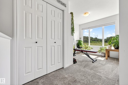 Room with neutral-toned carpet flooring and white walls - 20507 128 Avenue, Edmonton, AB 